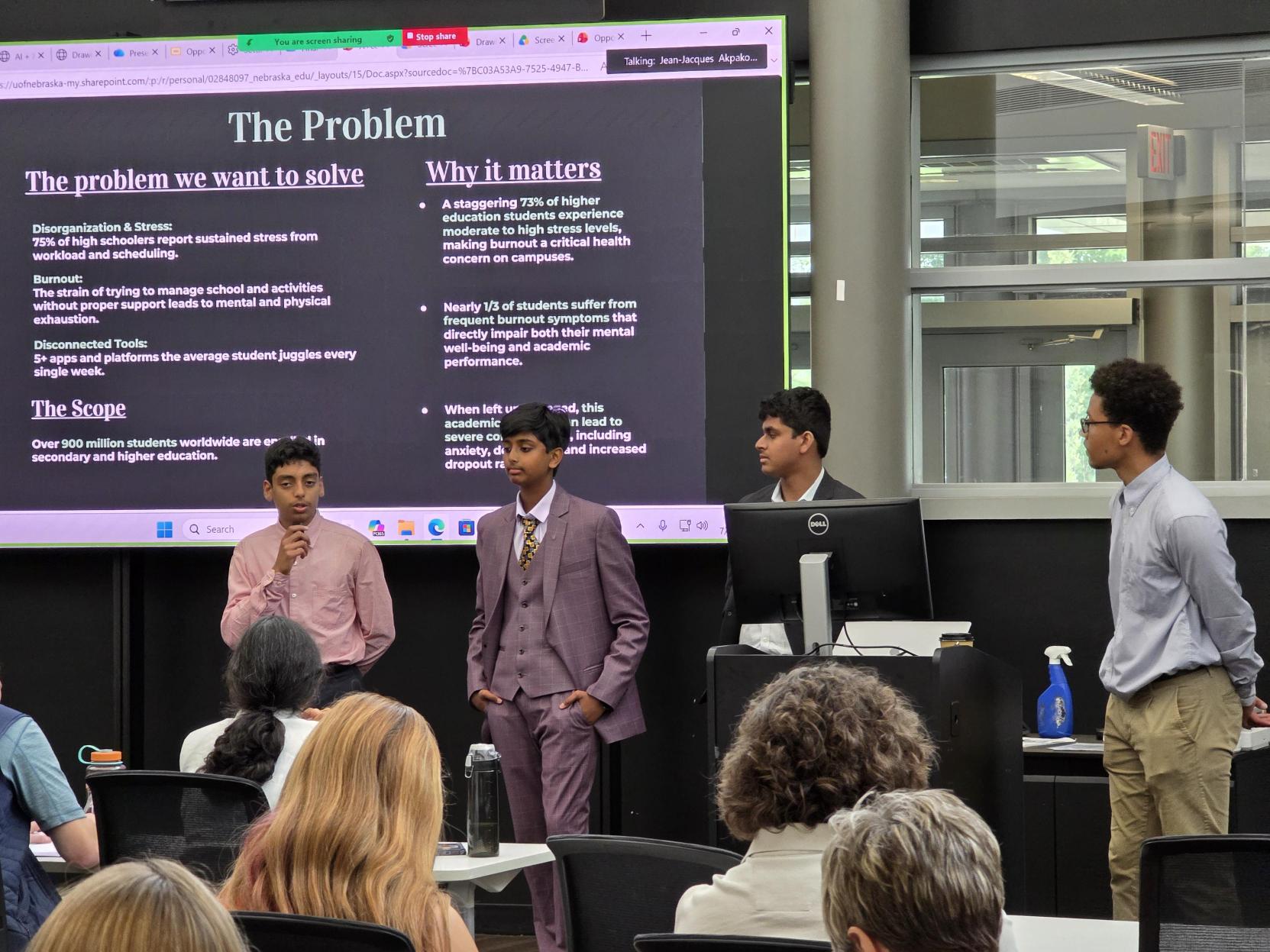A team lays out the problem they set out to solve for students juggling school and activities.